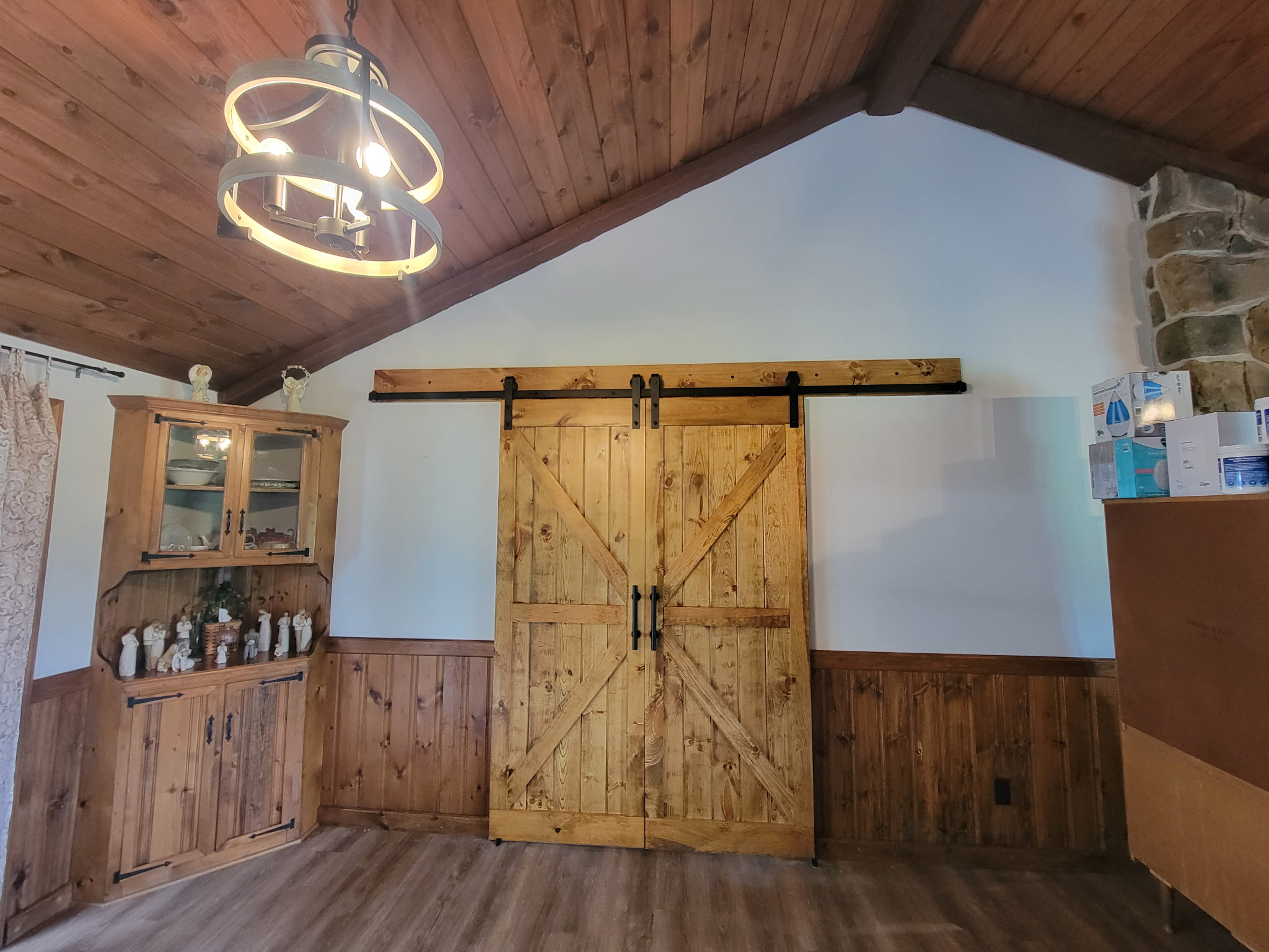 Indoor sliding barn door installed by Jared D. Aungst Construction in a home.